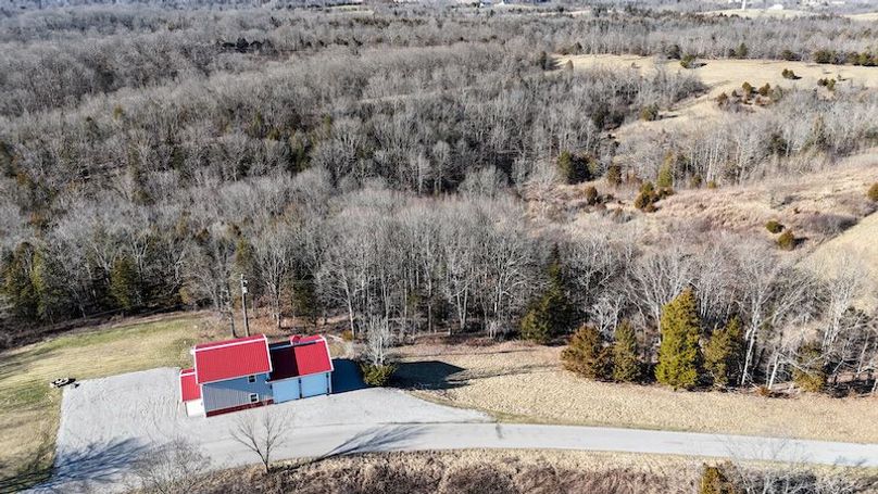 001 aerial drone shot from the east boundary and road overlooking the property
