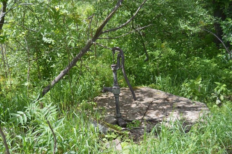 Old well by barn