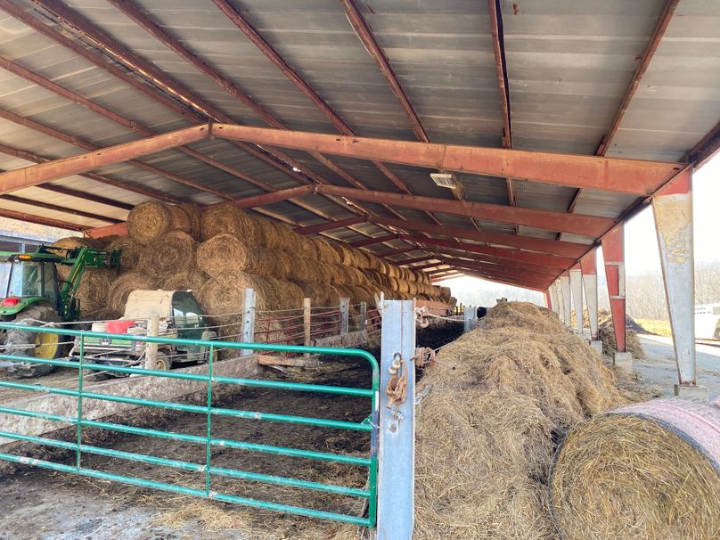 051 inside shot of the steel shed used for feeding and hay_equipment storage copy