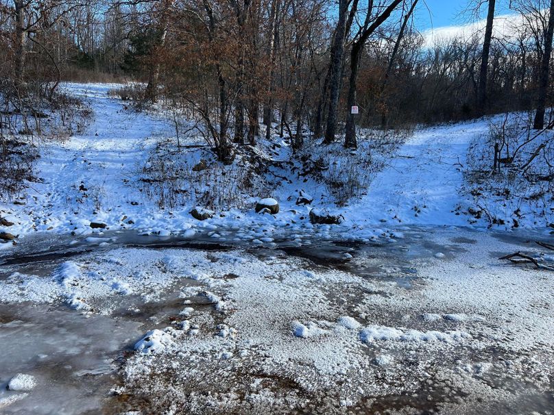 multiple 4 wheel drive paths on property taken in winter