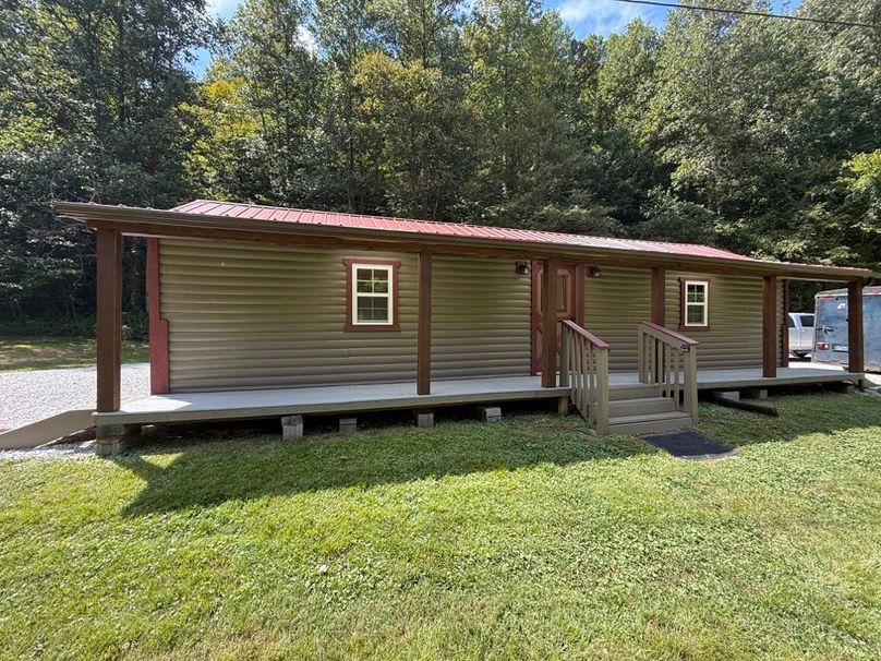 024 cabin 1 of the 2 main cabins viewed from the road