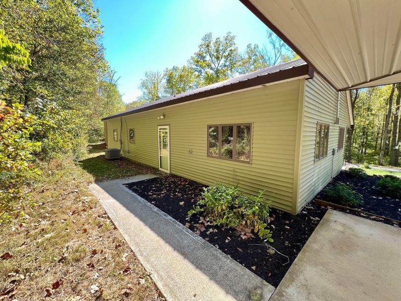 Stunning Wooded Acreage With Home And Outbuildings Adjoining Hoosier