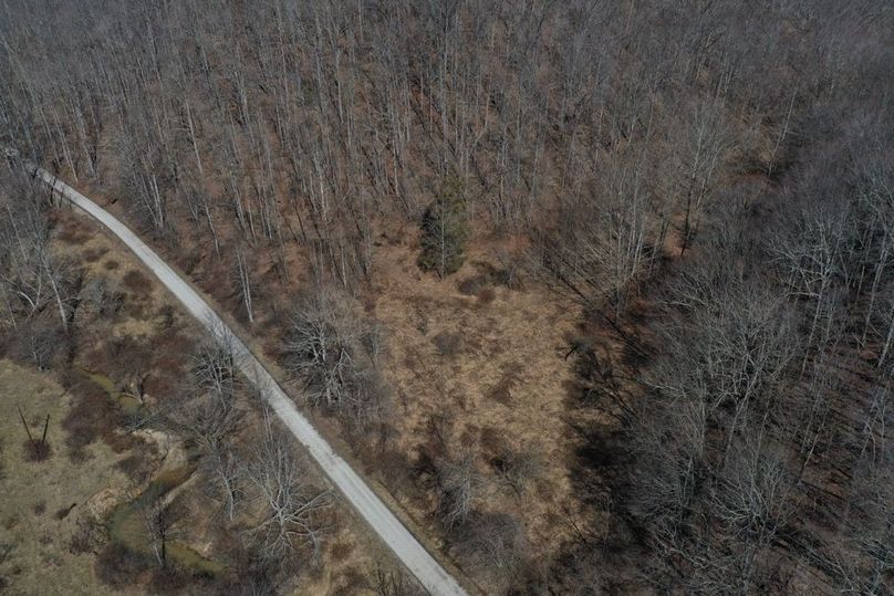 007 low elevation drone shot of the old homestead area in the south part of the property