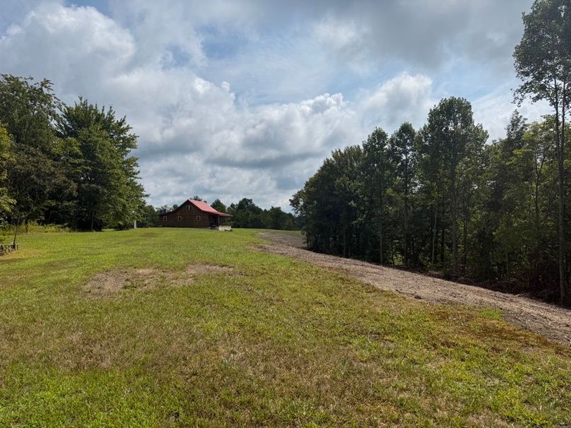 020 the view of the cabin as you come out of the woods