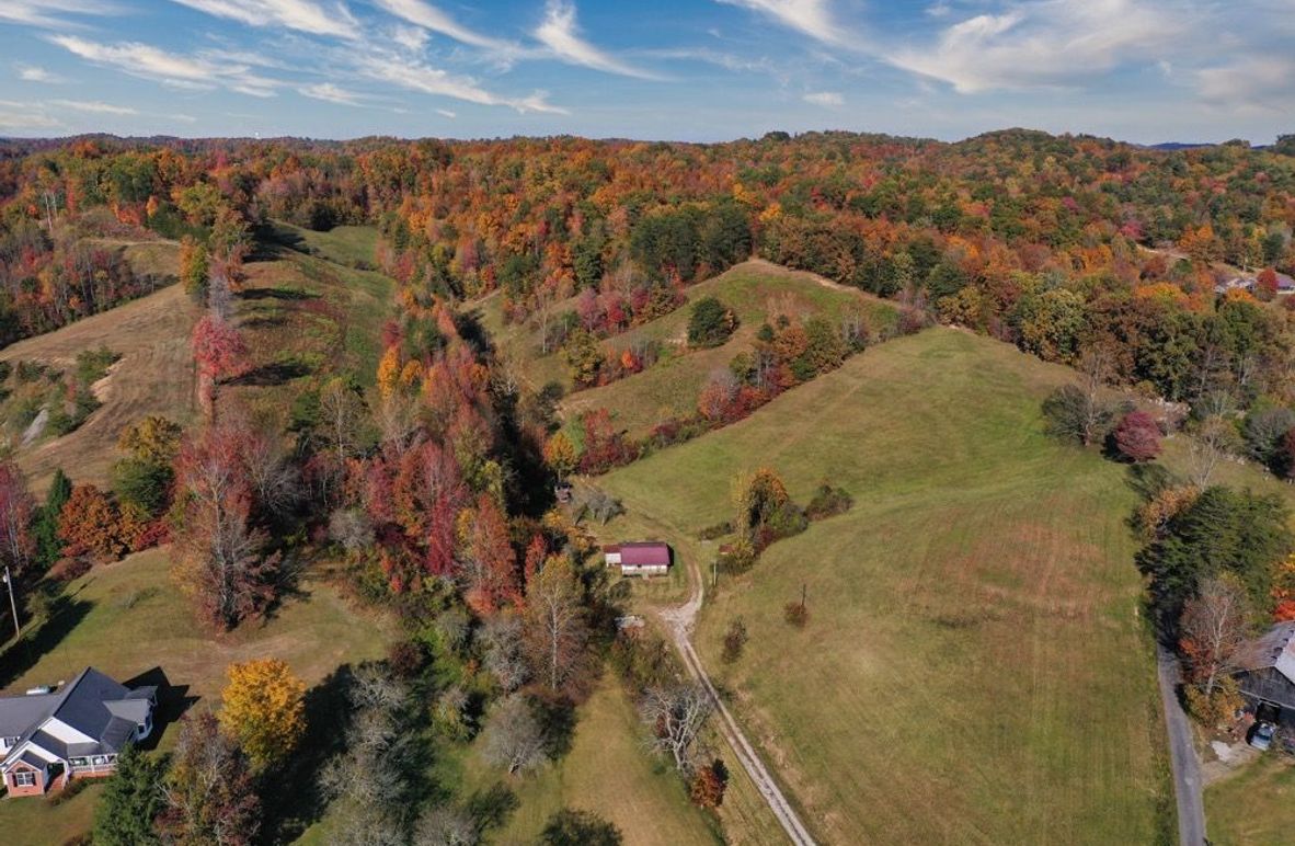 001 beautiful aerial drone shot from the south boundary of the property at the entrance looking north-2