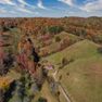 001 beautiful aerial drone shot from the south boundary of the property at the entrance looking north-2