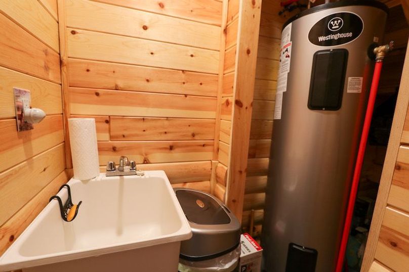 045 the utility and mechanical room located under the stair way