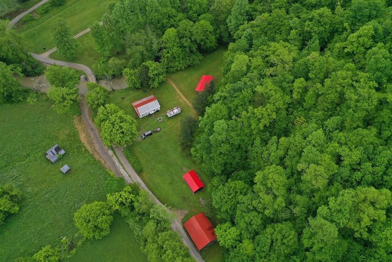 010 low elevation drone shot directly over the home and structures