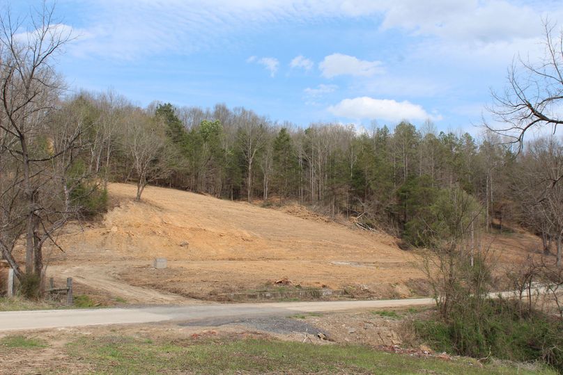 001 view along the blacktop road of the building area