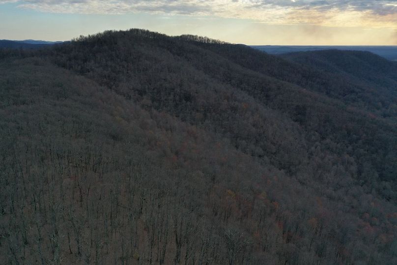 017 aerial drone shot from the south ridgeline boundary looking west across the rolling mountains