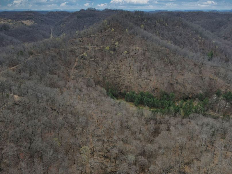 033 aerial overview looking south over the property