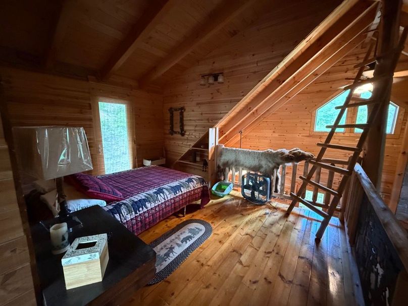 047 loft area used for additional sleeping area at the top of the steps in upper level