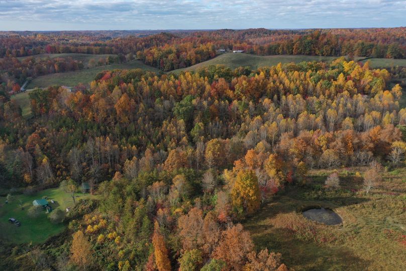 004 mid elevation drone shot from the north looking over the property