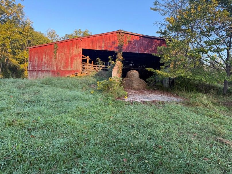 005 Additional barn structure provides versatile agricultural use and adds to the property’s classic farm appeal.