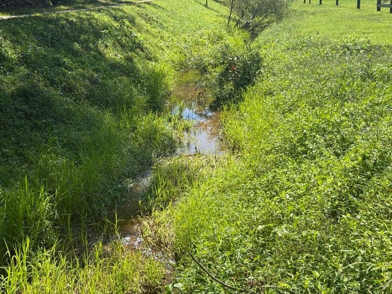 007 Gilmore Creek, running along the east side of the property