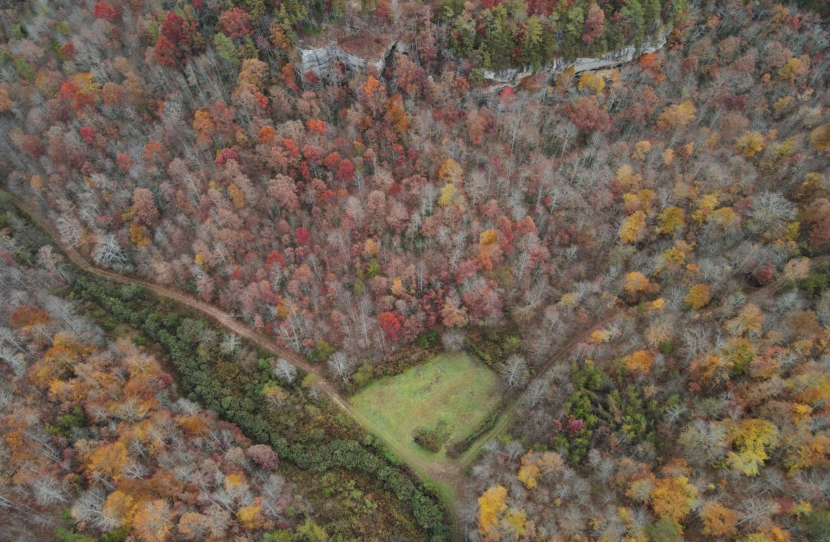 002 amazing drone shot looking towards the fields and rock cliffs