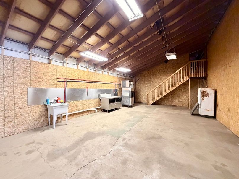 3.Copy of Tract 1 Lodge Front Workshop_Loft Stairs Large