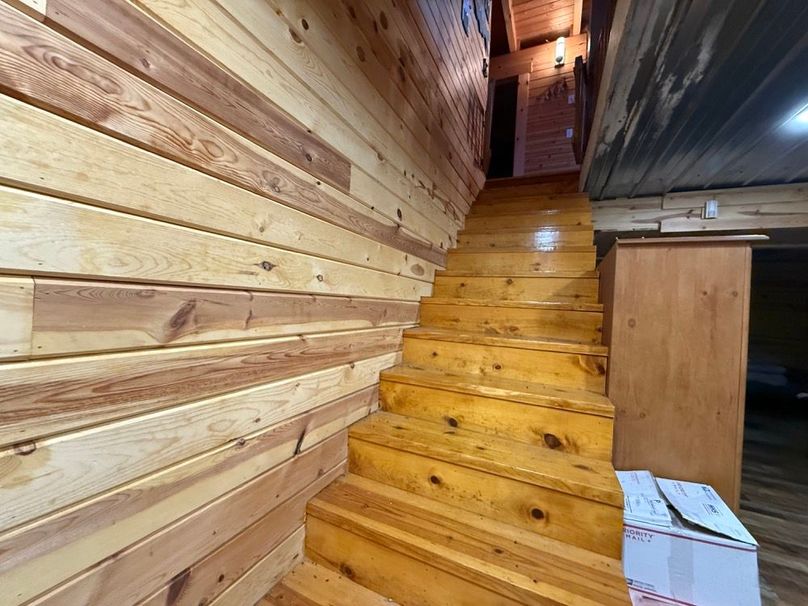 052 stairway leading down to the lower level