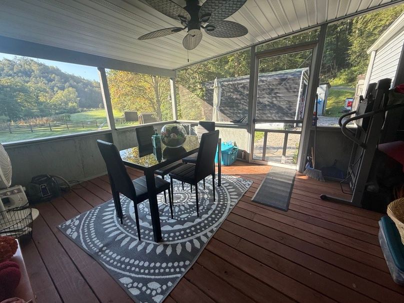 033 the screened in covered backporch area perfect for those evening sits or dinner