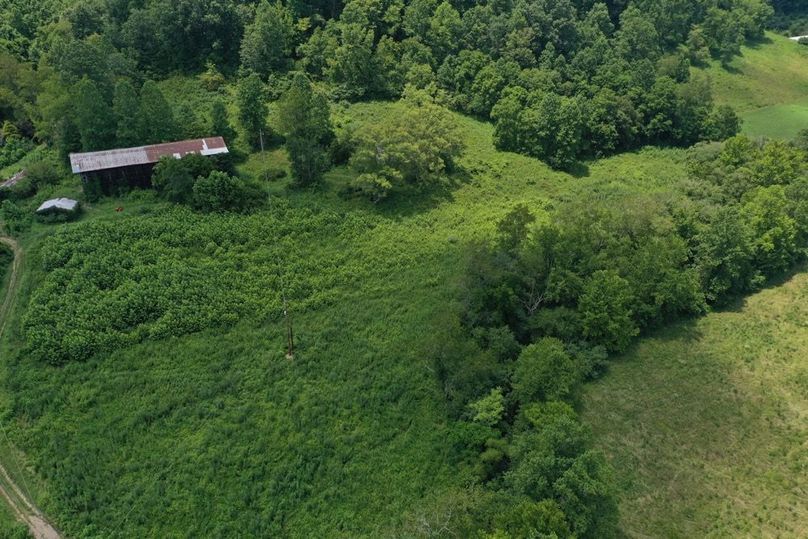 027 aerial drone view of east fields and barn on the north side of the driveway