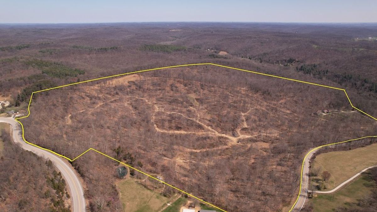 Stunning Wooded Acreage With Home And Outbuildings Adjoining Hoosier