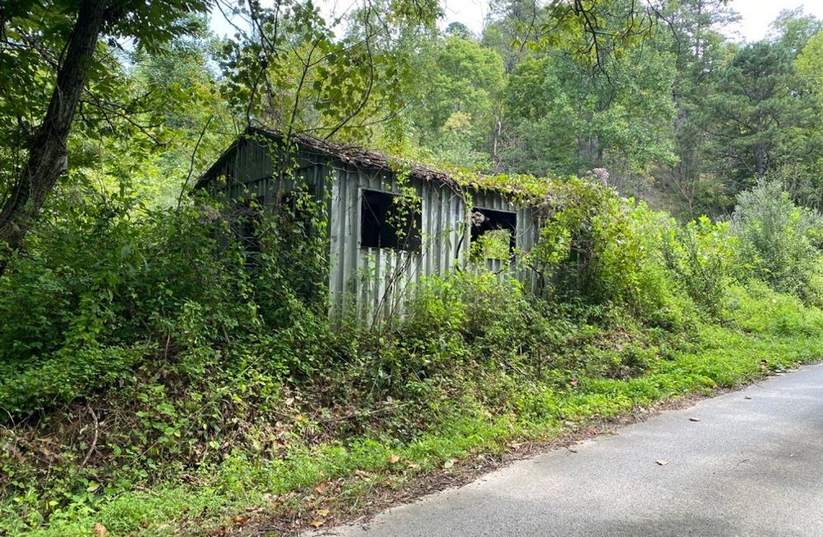 003 the old building sitting alongside the road in the west area of the property copy