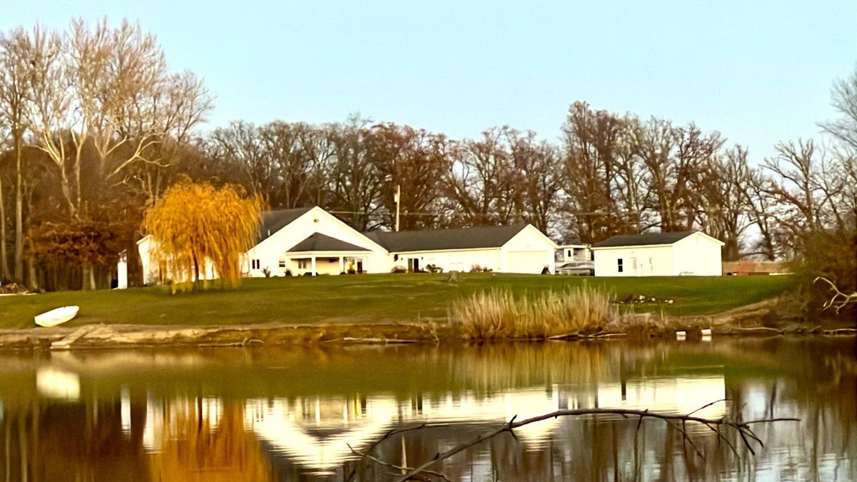 Nicely Updated Country Home With An Inground Pool & Large Pond On The