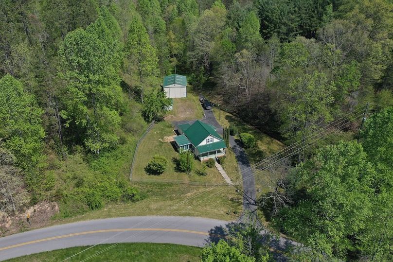 005 aerial drone shot from the south edge of the property looking north over the structures