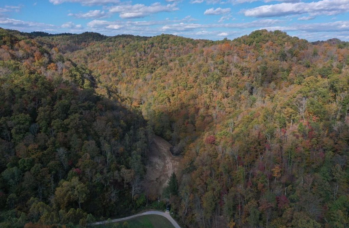 004 drone view of the property viewed from the south