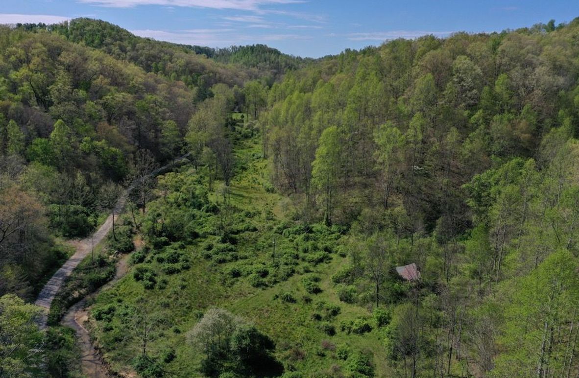 001 aerial drone shot of the old home site in the east part of the property