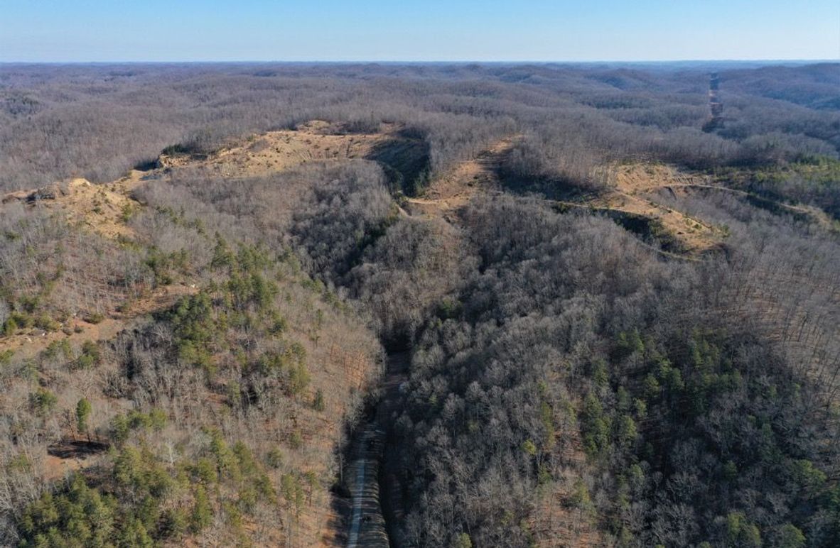 001 Aerial drone shot from the south edge of the property looking north