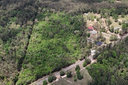 Versatile 56-Acre Tract with Dual Road Frontage & Creek Bottom