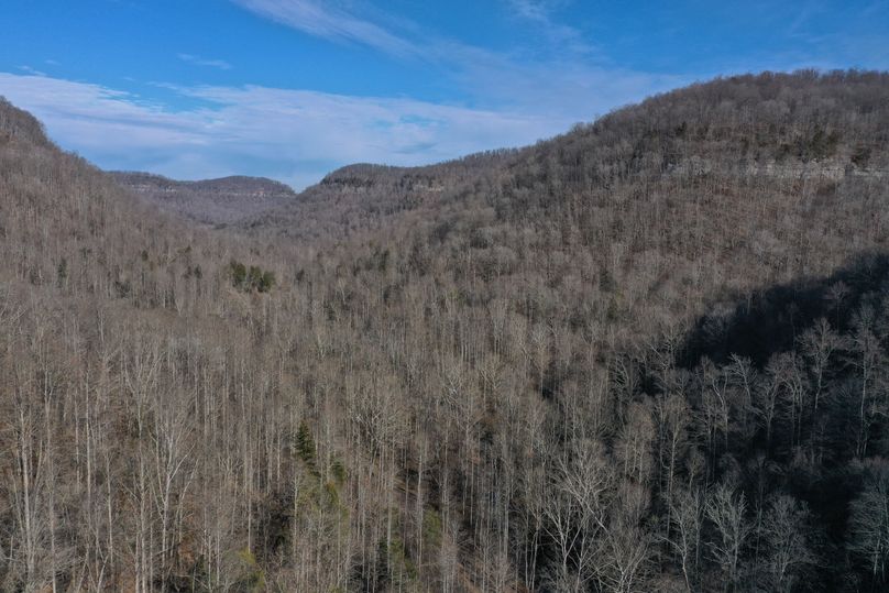 007 low elevation drone shot from the north portion of the property looking down the valley to the north