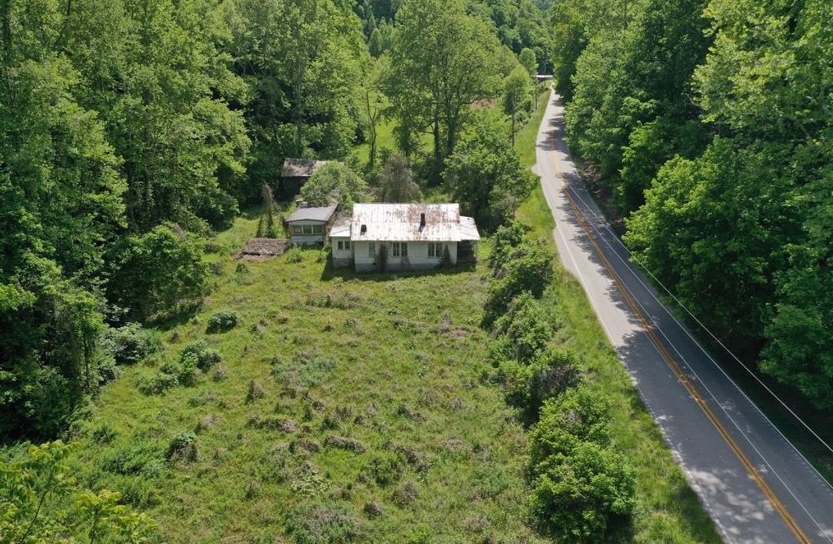 001 low elevation drone shot in along KY 30