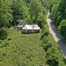 001 low elevation drone shot in along KY 30
