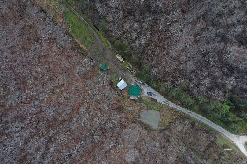 029 low elevation drone shot looking straight down on the structures