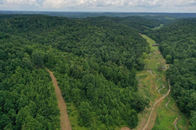026 aerial drone view from the middle of the property looking down the valley to the north