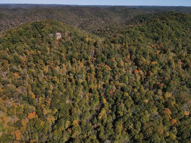 003 drone view of the timber and rock outcroppings-2