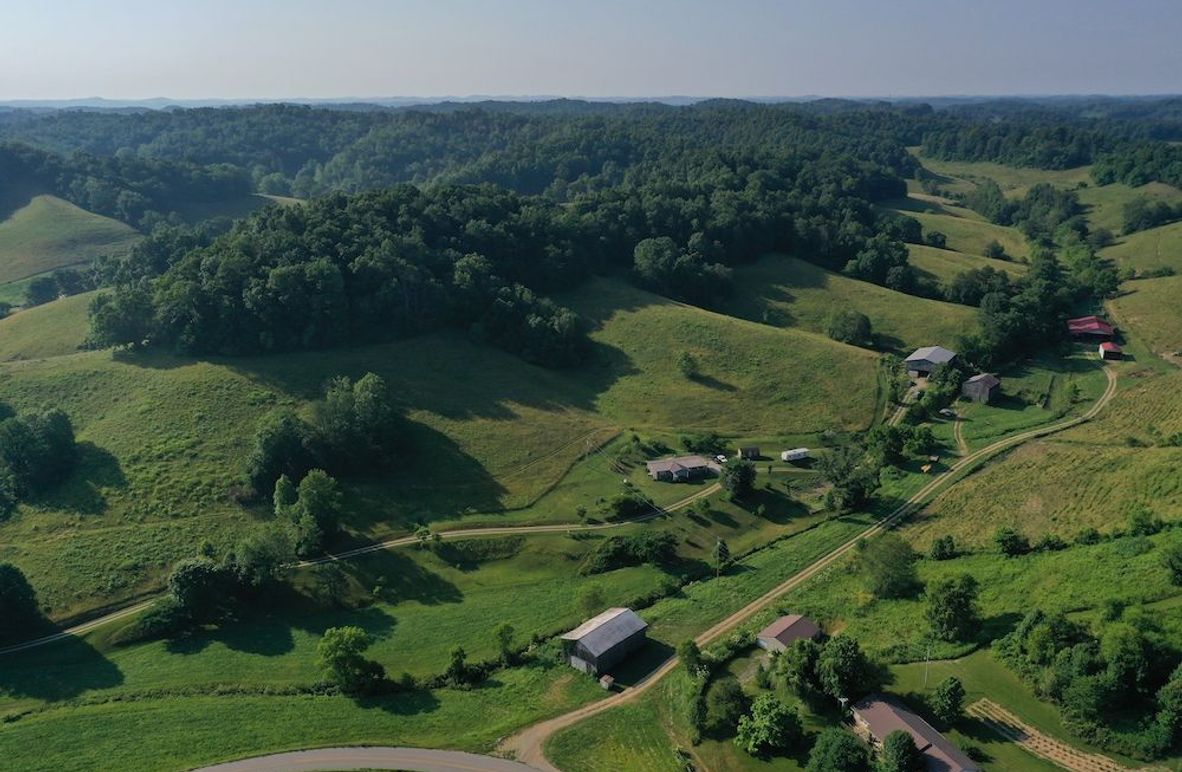 001 aerial drone view from the north looking south over the property