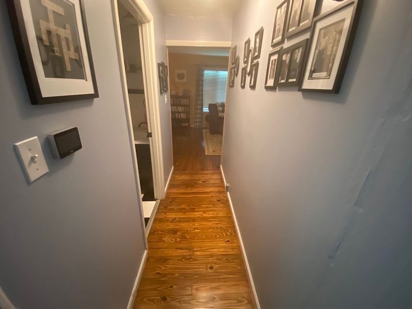 034 hallroom leading from the kitchen to the main living room area copy