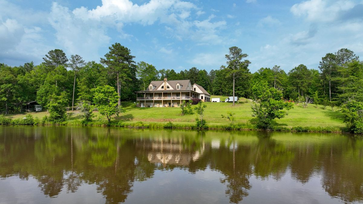 Beautiful Home Overlooking Pond | Whitetail Properties