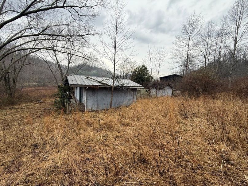 015 backside view of the old home just up from the barn