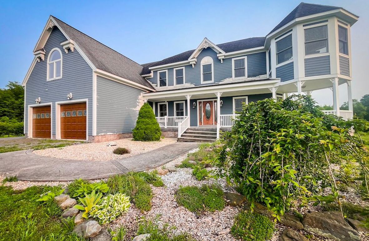 Tompkins_40.29_Waugh Photo 1