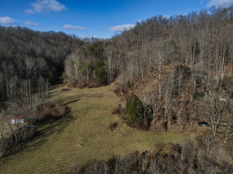 015 elevated view from above the road looking at the front fields and gated entrance