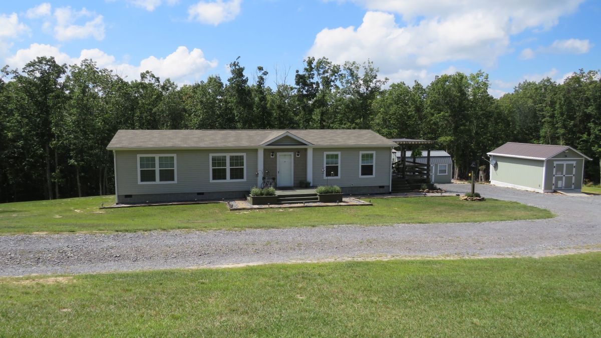 Home On Acreage Near Trout Streams And Public Land Whitetail Properties