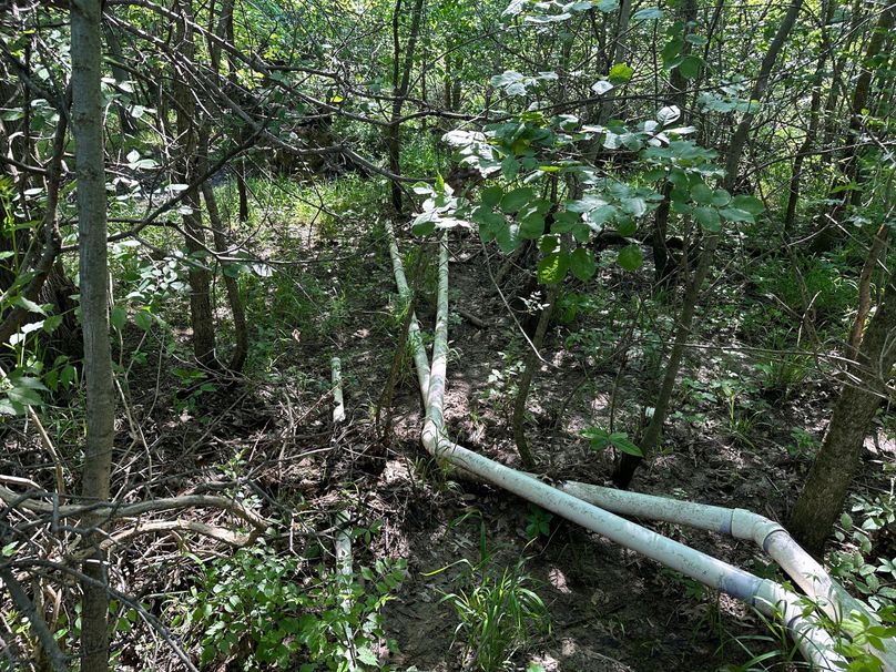pipes that connect to pump to flood 4 acre field