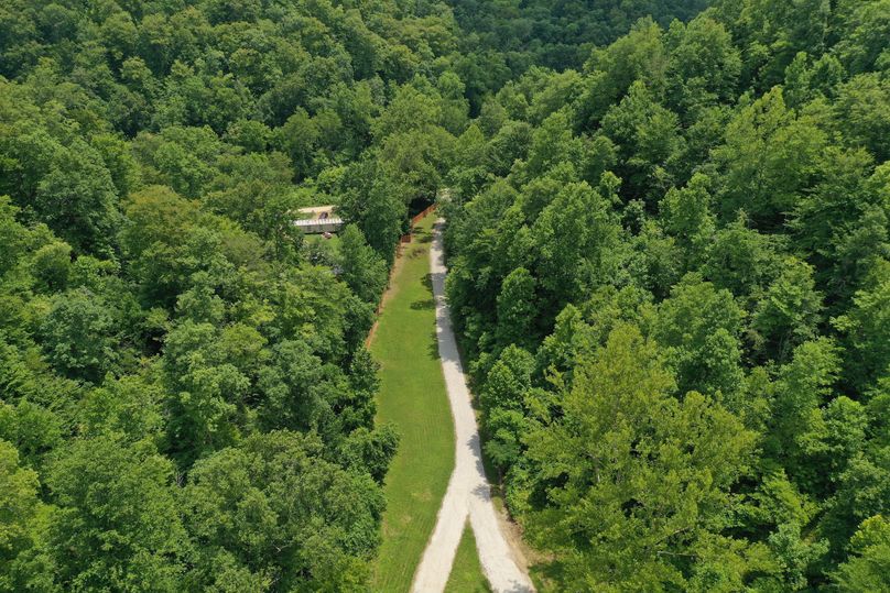 023 low elevation aerial drone shot from the old homestead looking southeast toward Zeke Br. Road