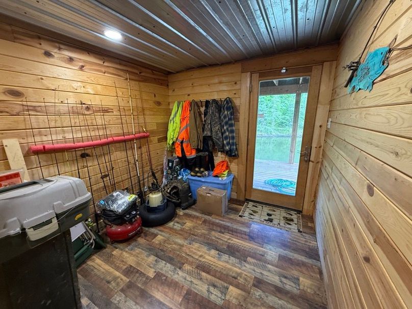 061 the the fishing pole and tackle room, as you head out to the pond