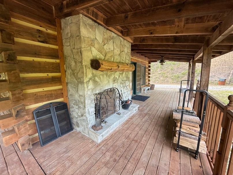 037 we even have a beautiful fireplace out on the deck area on the east side of the cabin