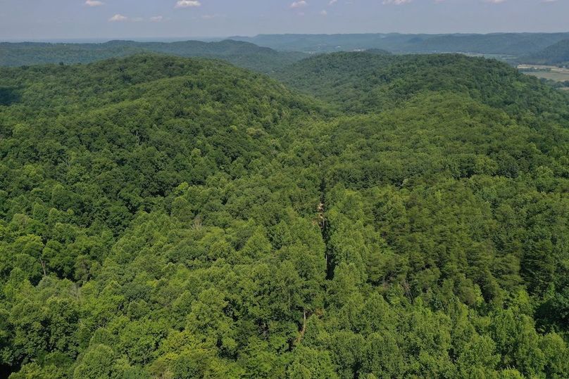 007 aerial drone shot from the east boundary looking to the northwest over the property